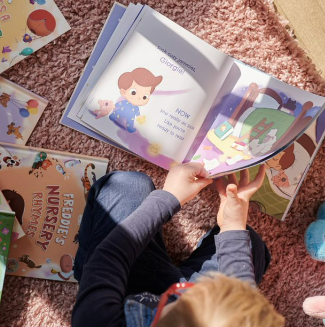A child flips through their unique diy bedtime book for kids aged 0 - 5.