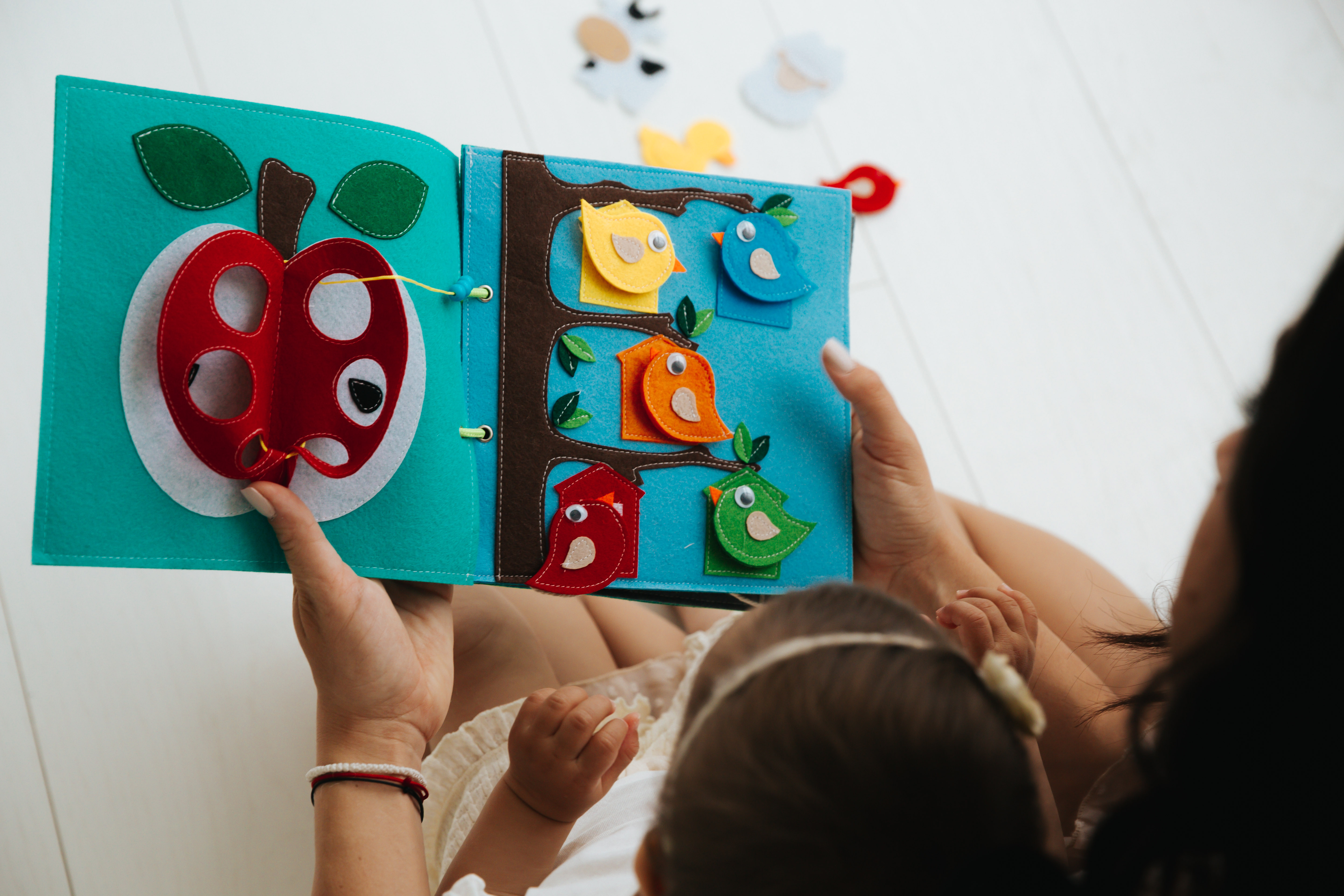 Quiet busy books are a great way to develop motor skills and encourage creativity.