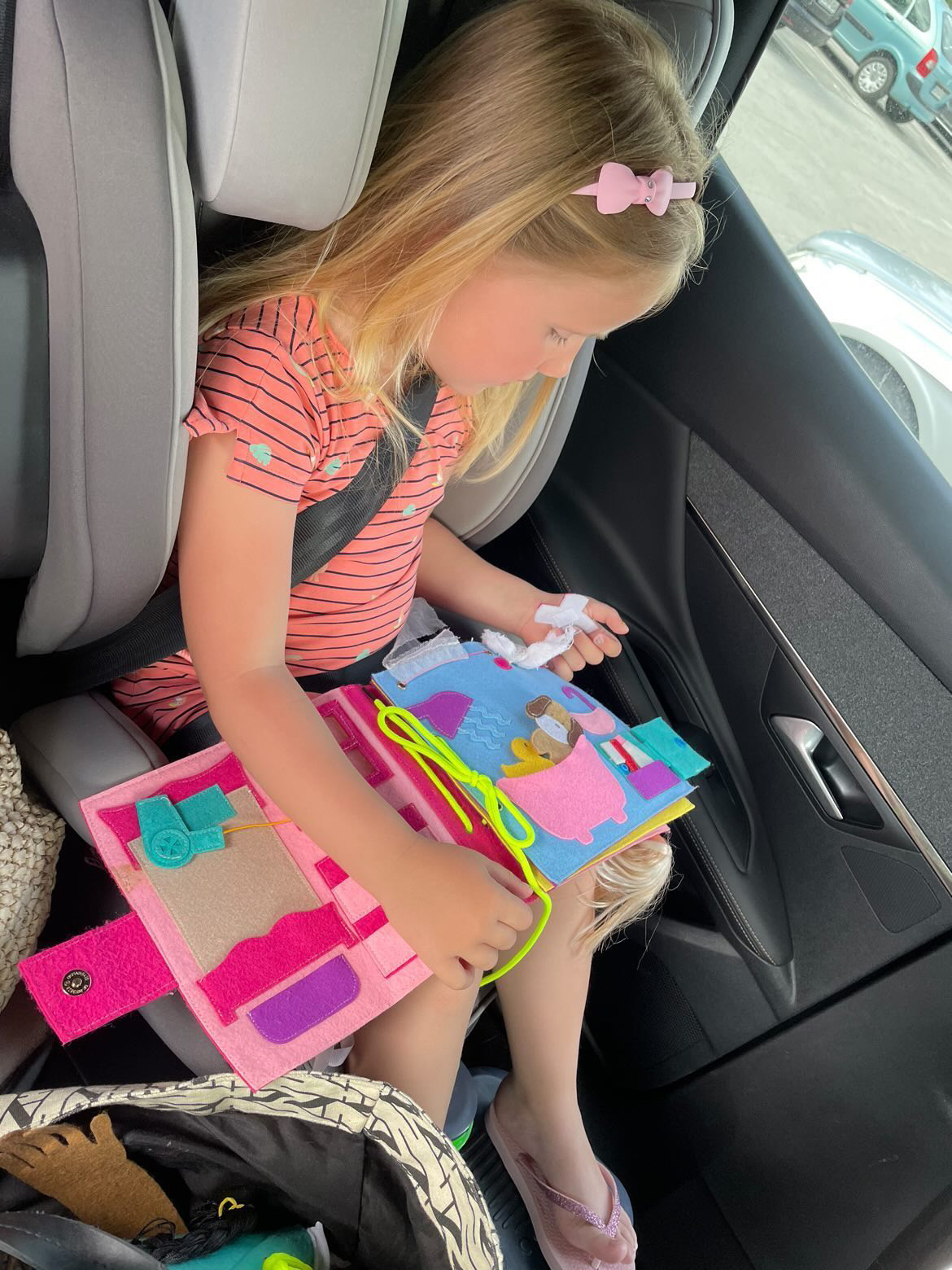 Quiet books are excellent activities for kids while travelling.