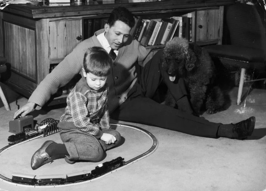 A father playing with his son - the history of Father's day.