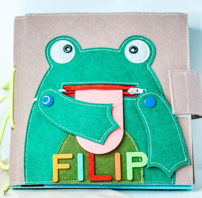 A customized Quiet Busy Book all about farm animals.